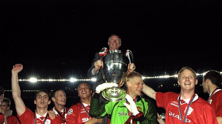 26 May 1999:  Alex Ferguson celebrates with Manchester United players and the European Cup after winning the European Champions League Final against Bayern